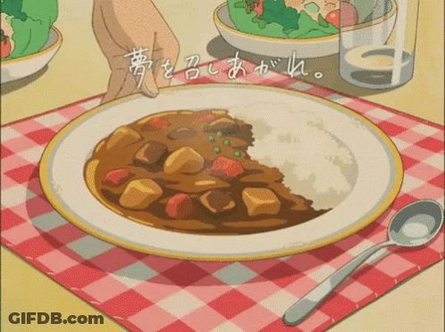 A Plate Of Curry Sits On A Checkered Tablecloth GIF