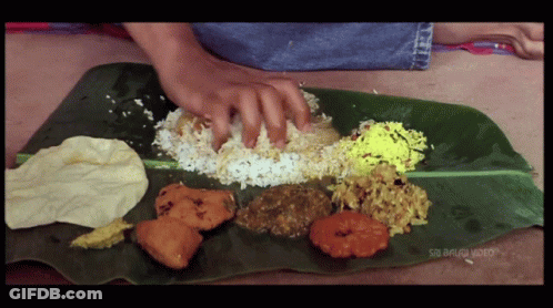 A Plate Of Food On A Banana Leaf That Says Sri Balaji Video On The Bottom GIF