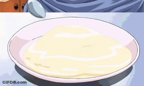 A Plate Of Food With A Spoon On It GIF