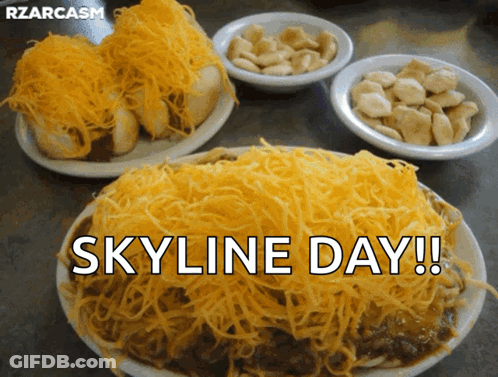 A Plate Of Food With The Words Skyline Day Written Above It GIF