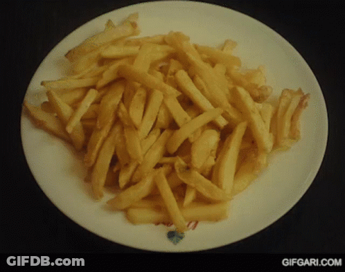A Plate Of French Fries With A Gifgari.com Logo GIF