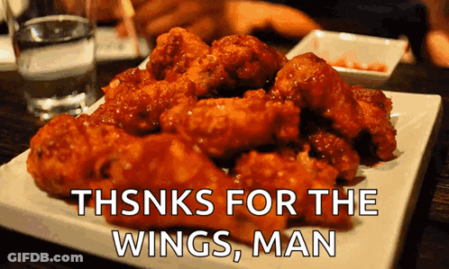 A Plate Of Fried Chicken Wings With The Words Thanks For The Wings Man GIF