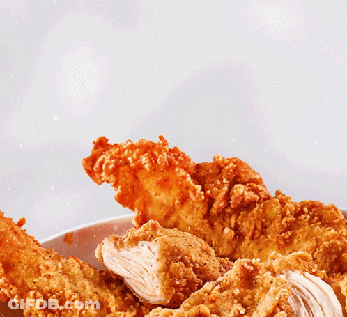 A Plate Of Fried Chicken With The Words Dip Eat Written In Red GIF
