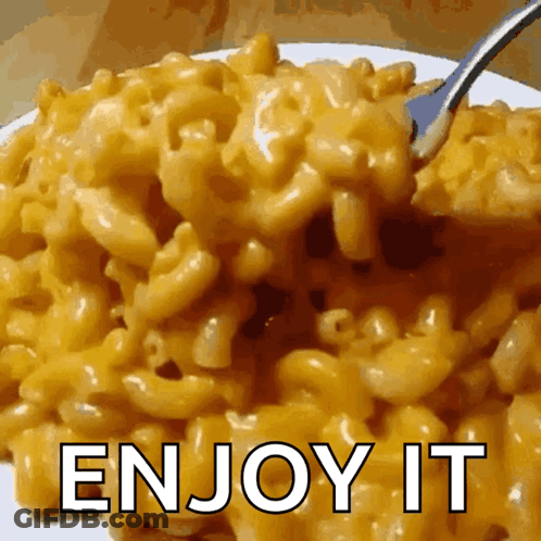 A Plate Of Macaroni And Cheese With The Words Enjoy It Written On It GIF