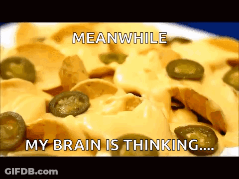 A Plate Of Nachos With Cheese And Jalapenos With A Caption That Says Meanwhile My Brain Is Thinking GIF