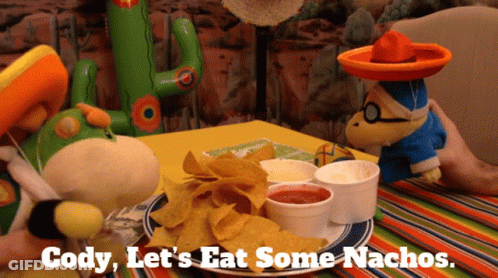 A Plate Of Nachos With The Words Cody Let 'S Eat Some Nachos Written On It GIF