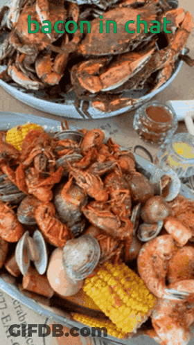 A Plate Of Seafood With The Words Bacon In Chat Written On It GIF