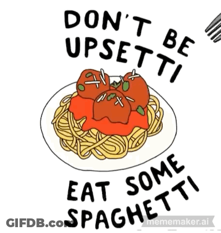 A Plate Of Spaghetti And Meatballs With A Fork In It GIF