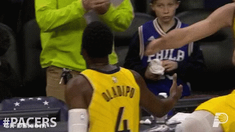 A Player Wearing A Yellow Jersey With Gladipo On The Back GIF