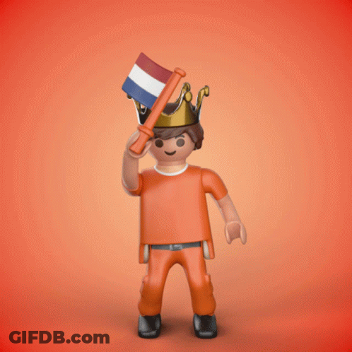 A Playmobil Figure Has A Crown On His Head And Holds A Flag GIF