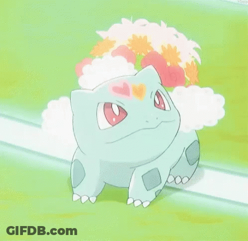 A Pokemon With A Flower On Its Head Is Sitting On A Grassy Field With Its Mouth Open . GIF