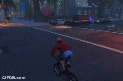 A Police Car Is Driving Down A Street With A White Arrow Pointing To The Left GIF