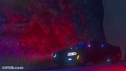A Police Car Is Parked On The Side Of The Road GIF