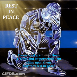 A Police Officer Is Kneeling Down In Front Of A Flag With A Quote That Says Rest In Peace . GIF