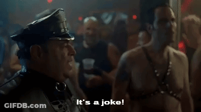 A Police Officer Is Standing Next To A Shirtless Man In A Club And Says `` It 'S A Joke '' . GIF