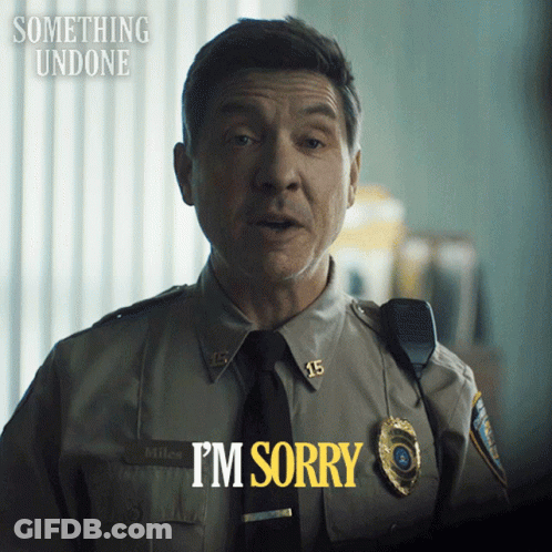 A Police Officer Says I 'M Sorry In Yellow GIF