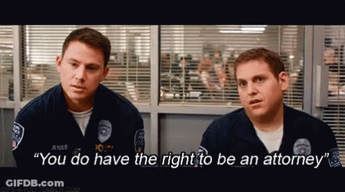 Police Officer Telling Another You Have Right To Attorney GIF