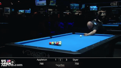 A Pool Table That Says Diamond On It With A Man Standing In Front Of It GIF