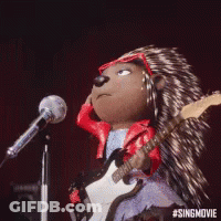A Porcupine Is Singing Into A Microphone While Holding A Guitar GIF