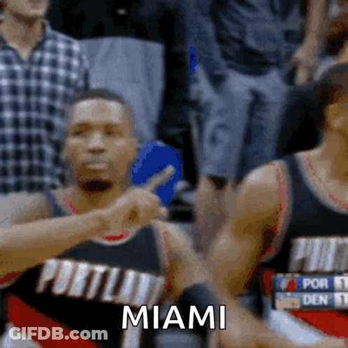 A Portland Basketball Player Is Pointing At The Crowd And The Word Miami Is Visible GIF