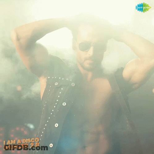 A Poster For A Movie Called I Am A Disco Dancer 2.0 Shows A Shirtless Man GIF