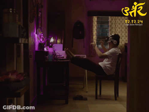 A Poster For A Movie Called I 'M Busy Shows A Man Wearing A Virtual Reality Headset GIF