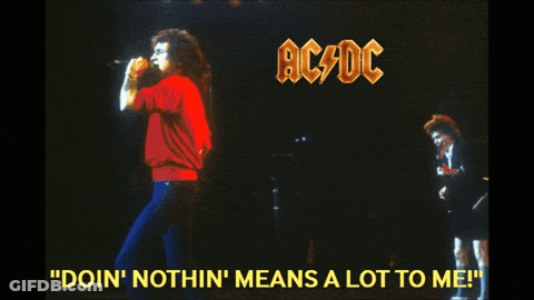 A Poster For Ac Dc Shows A Man Singing And A Man Playing A Guitar GIF