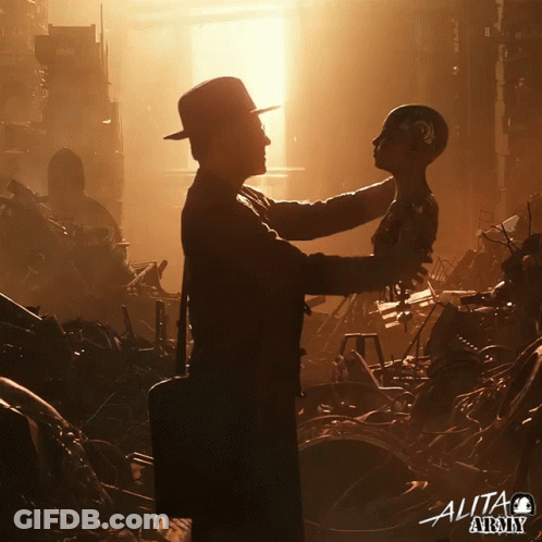 A Poster For Alita Army Shows A Man Holding A Robot In His Arms GIF