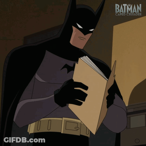A Poster For Batman Caped Crusader Shows A Cartoon Character Reading A Book GIF