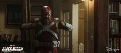 Black Widow Poster With Man In Red And White Costume GIF