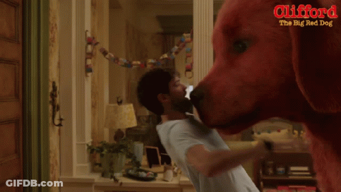 A Poster For Clifford The Big Red Dog Showing A Man And A Girl GIF