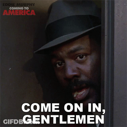 A Poster For Coming To America Shows A Man In A Hat Smiling GIF