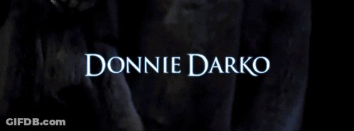 A Poster For Donnie Darko Features A Statue GIF
