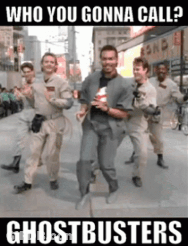 A Poster For Ghostbusters Shows A Group Of Men Running Down A Street GIF
