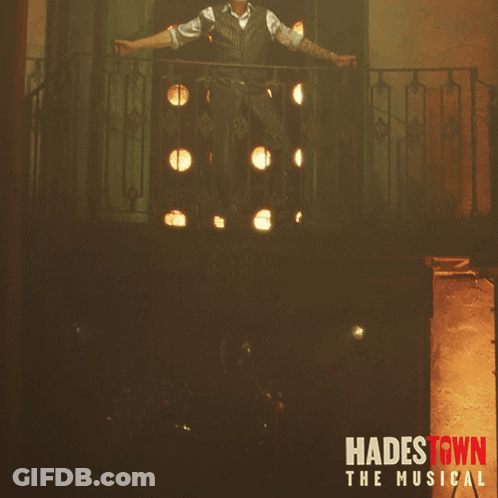 A Poster For Hadestown The Musical Features A Man Standing On A Balcony GIF