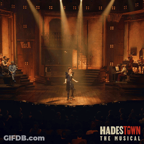 A Poster For Hadestown The Musical Shows A Woman Singing GIF