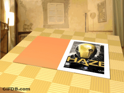 A Poster For Haze Is Sitting On A Checkered Table Cloth GIF