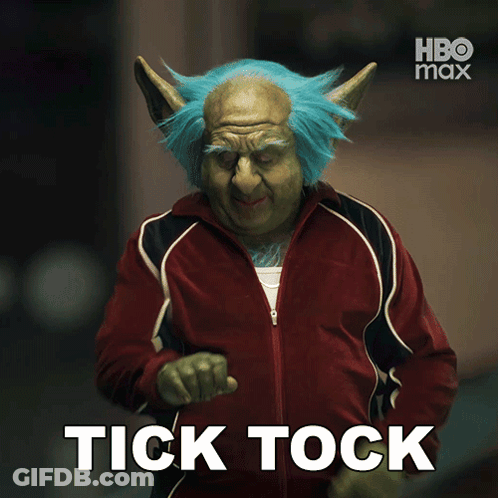 A Poster For Hbo Max Shows A Troll With Blue Hair And A Red Jacket GIF