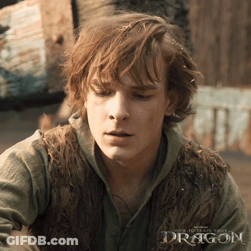 A Poster For How To Train Your Dragon Shows A Man GIF