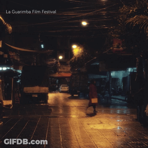 A Poster For La Guarimba Film Festival Shows A Dark Street GIF