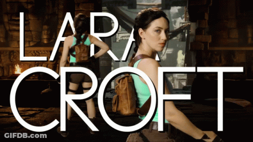 A Poster For Lara Croft Shows A Woman Holding A Sword GIF