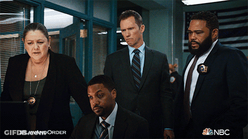 A Poster For Law And Order Shows A Group Of People In Suits GIF