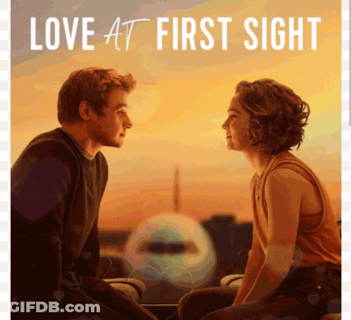 A Poster For Love At First Sight Shows A Man And Woman Looking At Each Other GIF