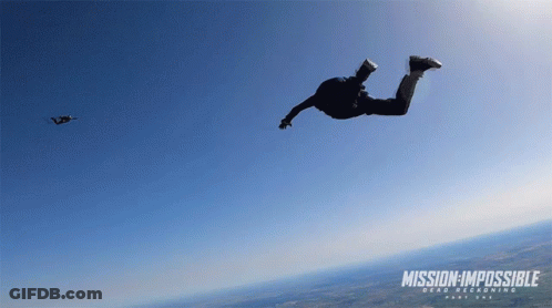 A Poster For Mission Impossible Shows A Man Jumping Through The Air GIF