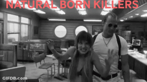 A Poster For Natural Born Killers Features A Man And Woman GIF