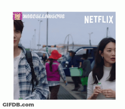 A Poster For Netflix Shows A Man And A Woman Walking GIF