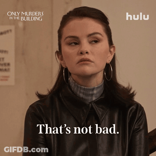 A Poster For Only Murders In The Building Shows A Woman Wearing A Leather Jacket GIF