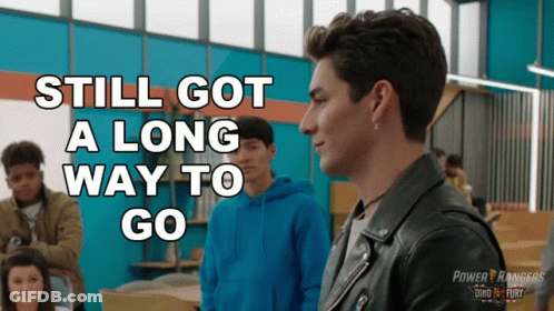 A Poster For Power Rangers Shows A Man In A Black Jacket GIF