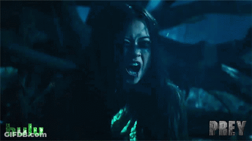 A Poster For Prey Shows A Woman With Her Mouth Open GIF