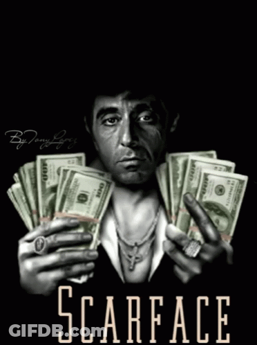 A Poster For Scarface Shows A Man Holding A Bunch Of Money GIF